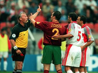 Turkey's Alpay Özalan is sent off against Portugal at Euro 2000.