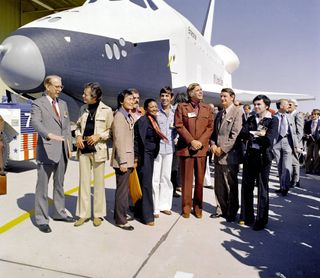 Actor Leonard Nimoy (center) posed with his fellow 'Star Trek' cast members in front of NASA's space shuttle Enterprise during the spacecraft prototype's unveiling in 1976. Nimoy died at age 83 on Feb. 27, 2015.