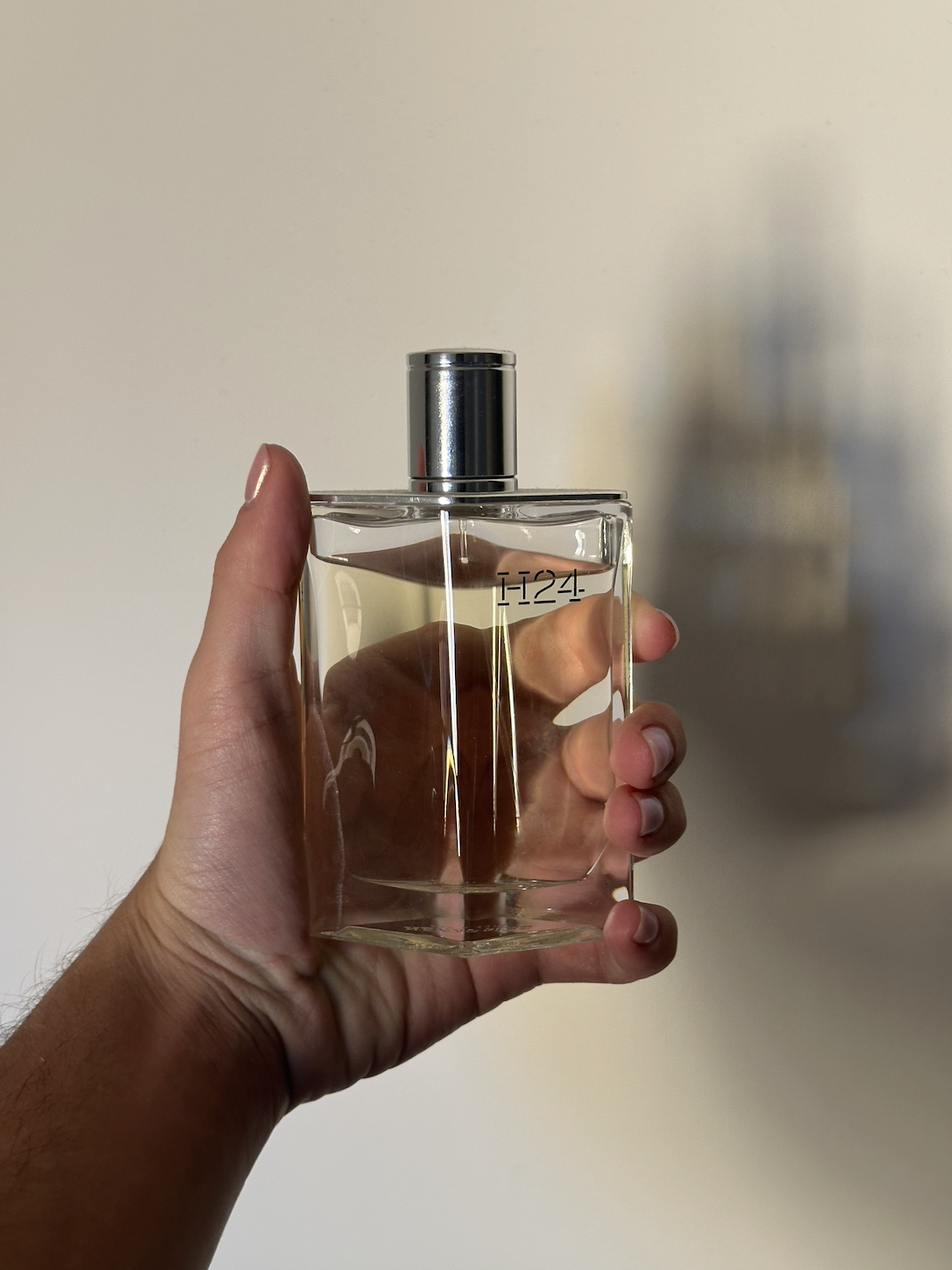 David Evan Ruff holding Herm&amp;eacute;s H24