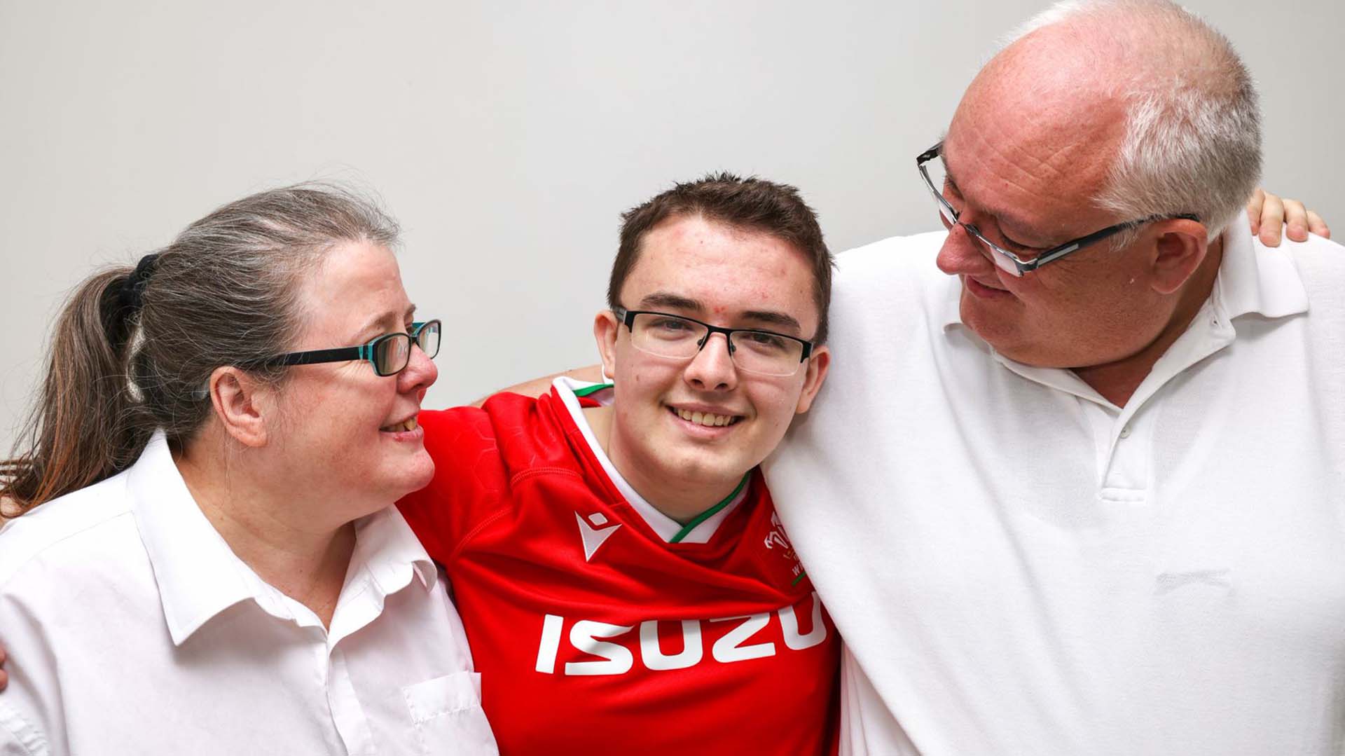 Evan with his parents dawn and richard