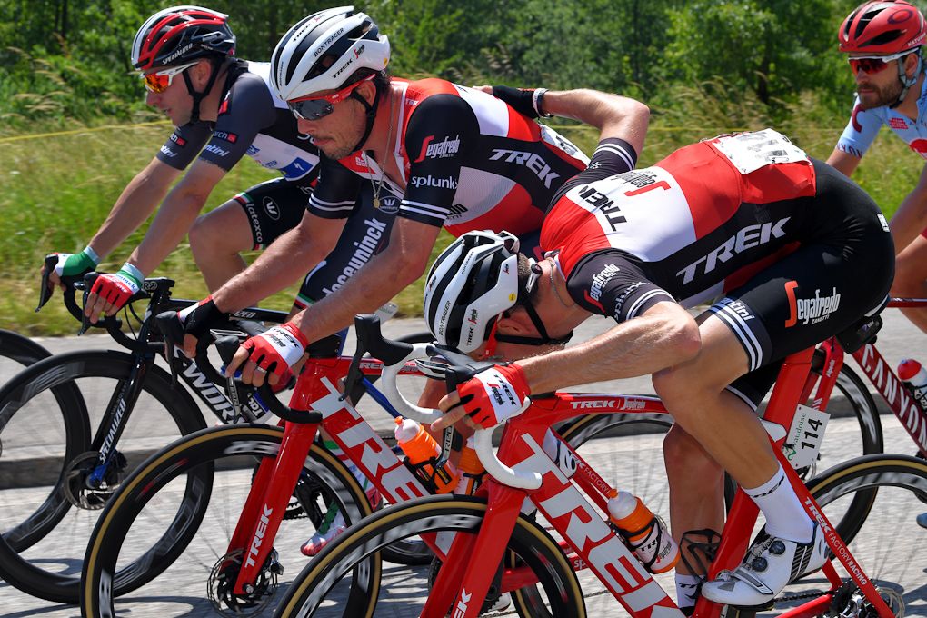 Michael Gogl rider checks John Degenkolb's machine during stage 5 at Tour de Suisse