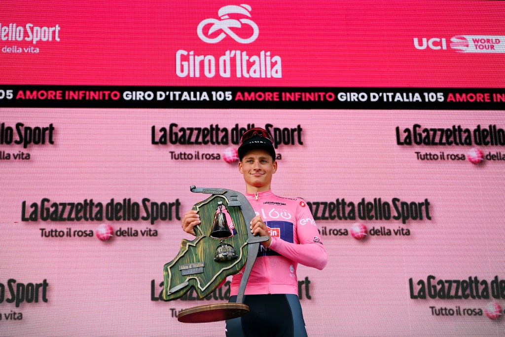 VISEGRAD HUNGARY MAY 06 Mathieu Van Der Poel of Netherlands and Team Alpecin Fenix celebrates at podium as pink leader jersey winner during the 105th Giro dItalia 2022 Stage 1 a 195km stage from Budapest to Visegrd 337m Giro WorldTour on May 06 2022 in Visegrad Hungary Photo by Tim de WaeleGetty Images