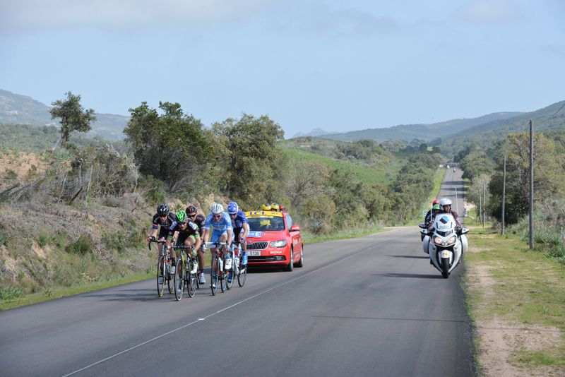 The breakaway working to establish its lead over the peloton