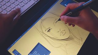 Drawing the woman on a graphics tablet