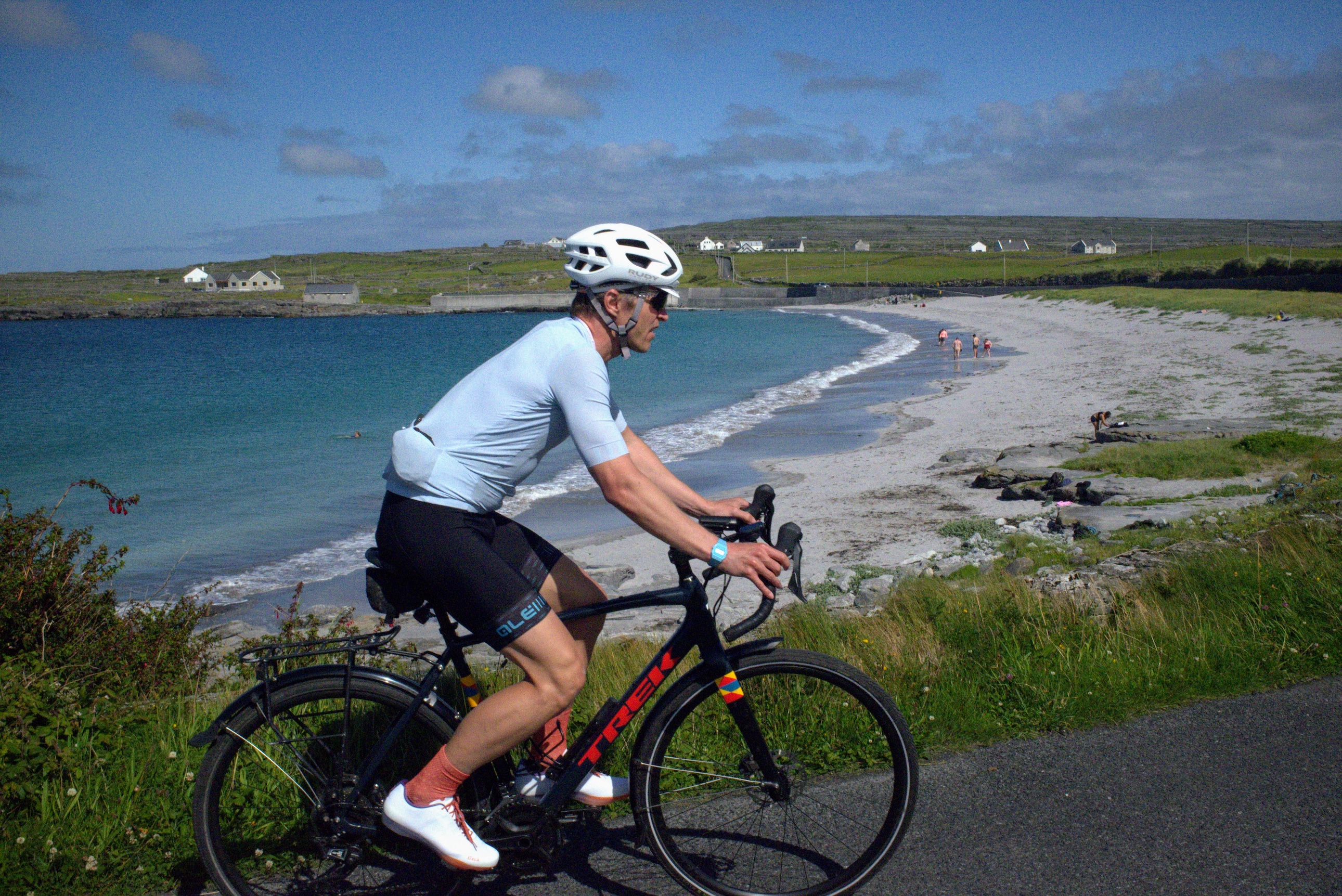 David Bradford riding in the foreground with Inishmore beach in the background