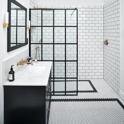 monochrome bathroom with crittall style shower screen