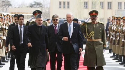 Joe Biden with former Afghan President Hamid Karzai during a visit in 2011