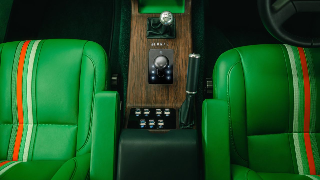 Details of the new Lunaz Range Rovers. One is very green, the other is still green but not as much. Both are nice.
