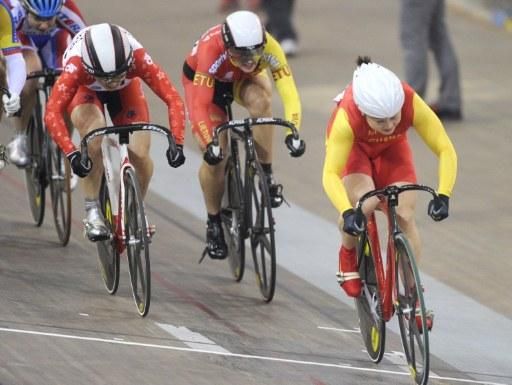 Shuang Guo (People's Republic of China) wins her third gold medal of the Beijing World Cup in the keirin.