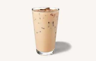 Image of a Starbucks Iced Chai Latte with skimmed milk and ice in a glass