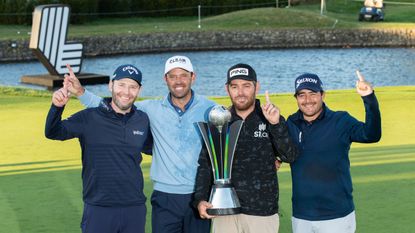 Team Stinger GC hold the trophy after winning the first LIV Golf event