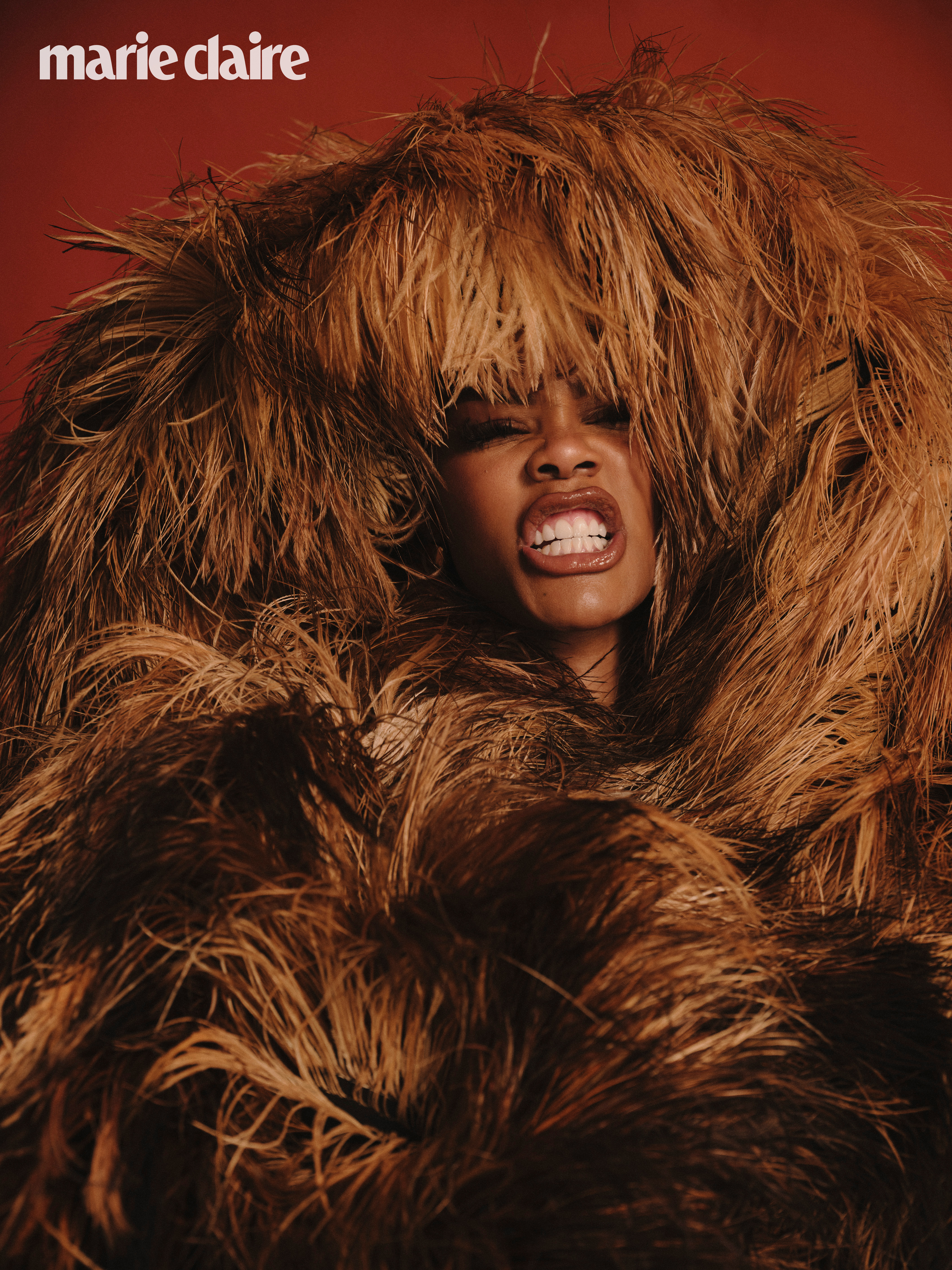 Teyana Taylor wearing a thick hairy jacket