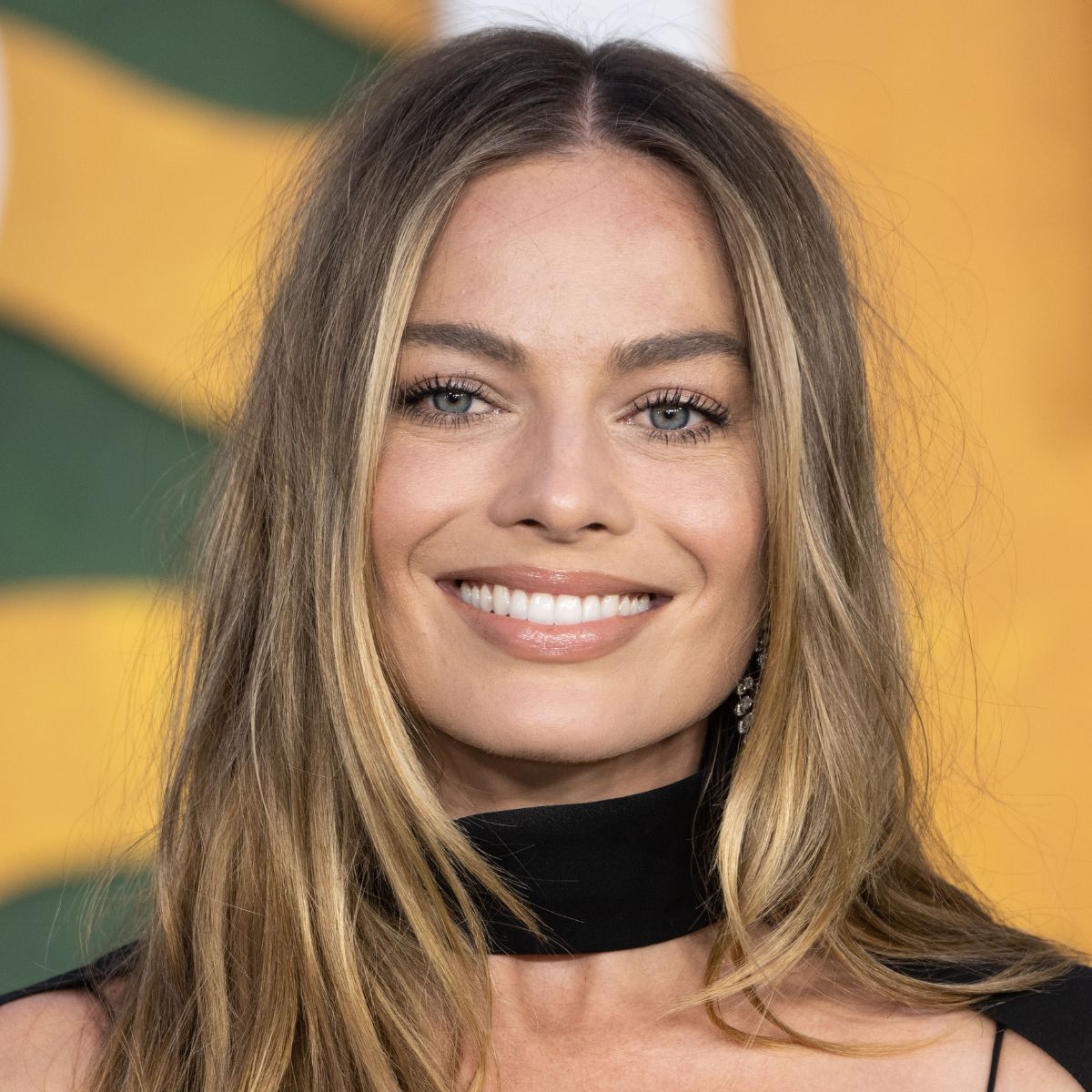 margot robbie on the red carpet in 2022 headshot