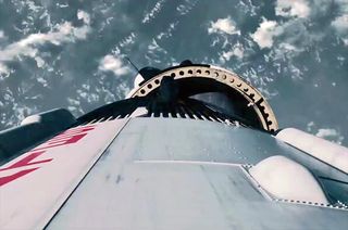 The rocket in Christopher Nolan's film "Interstellar" evokes the "very specific look" of NASA's Apollo-era Saturn V booster.