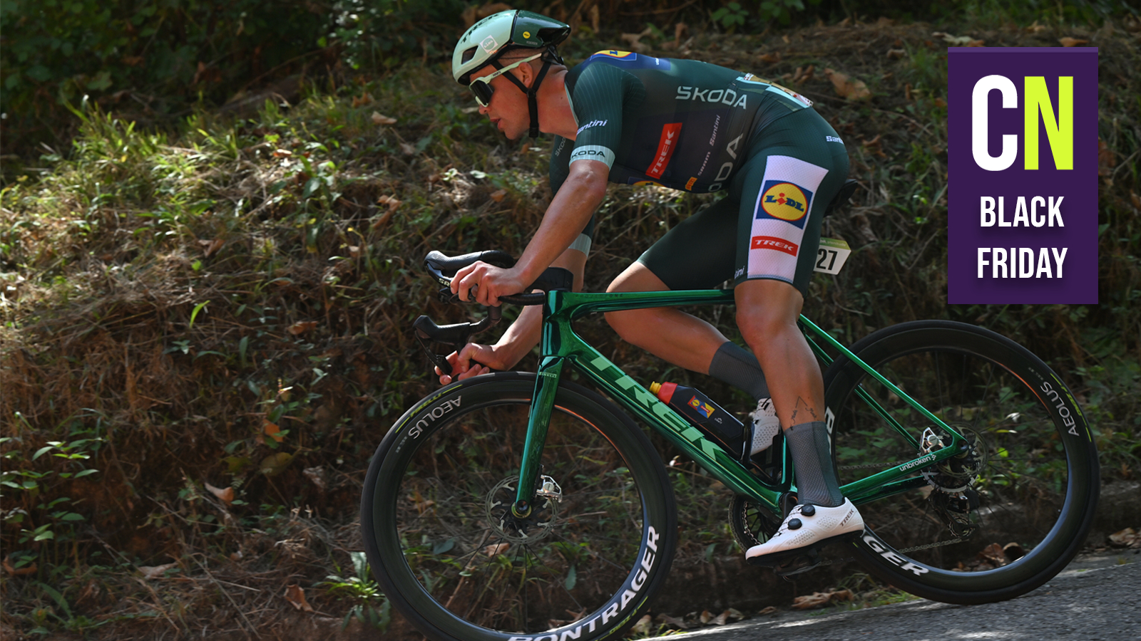 Mads Pedersen riding a green Trek Madone