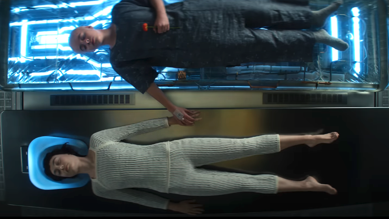 Marcy holding hands with Wendy as her consciousness is transferred in Alien: Earth episode 1