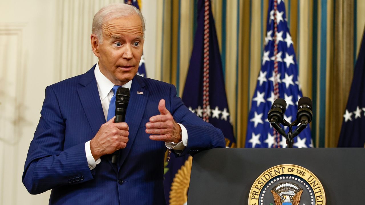 Joe Biden takes questions from reporters at the White House