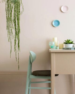 Pink Ground Farrow & Ball pink paint colour on dining rom walls with sage green dining chair