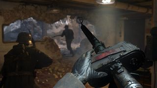 Running through a destroyed bunker in Call Of Duty WWII, while looking at a detailed machine gun