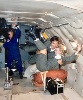 Alan Ladwig with Teacher in Space finalist Judy Garcia during a weightless training flight.