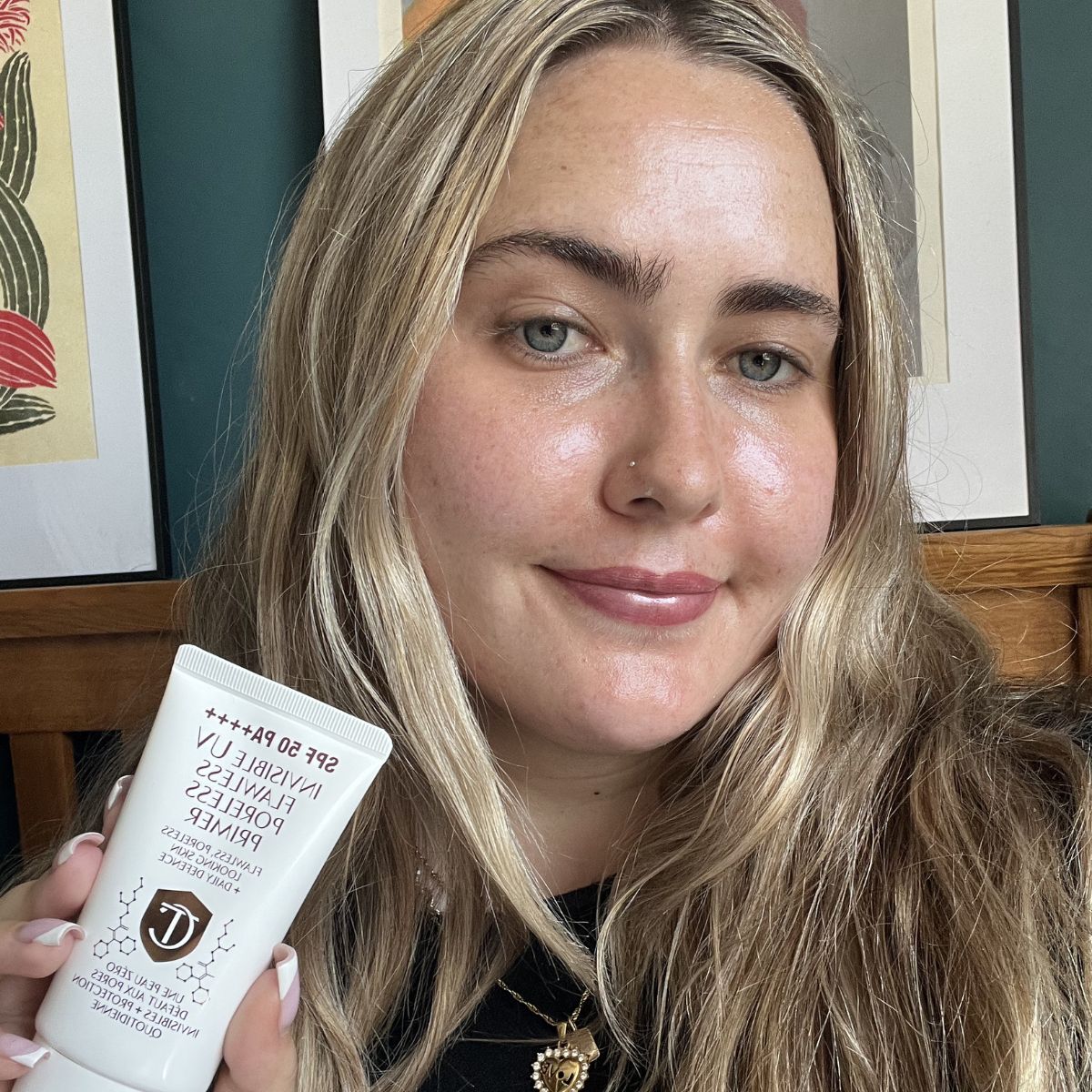 Amelia wearing Charlotte Tilbury Invisible Uv Flawless Poreless Primer 30ml