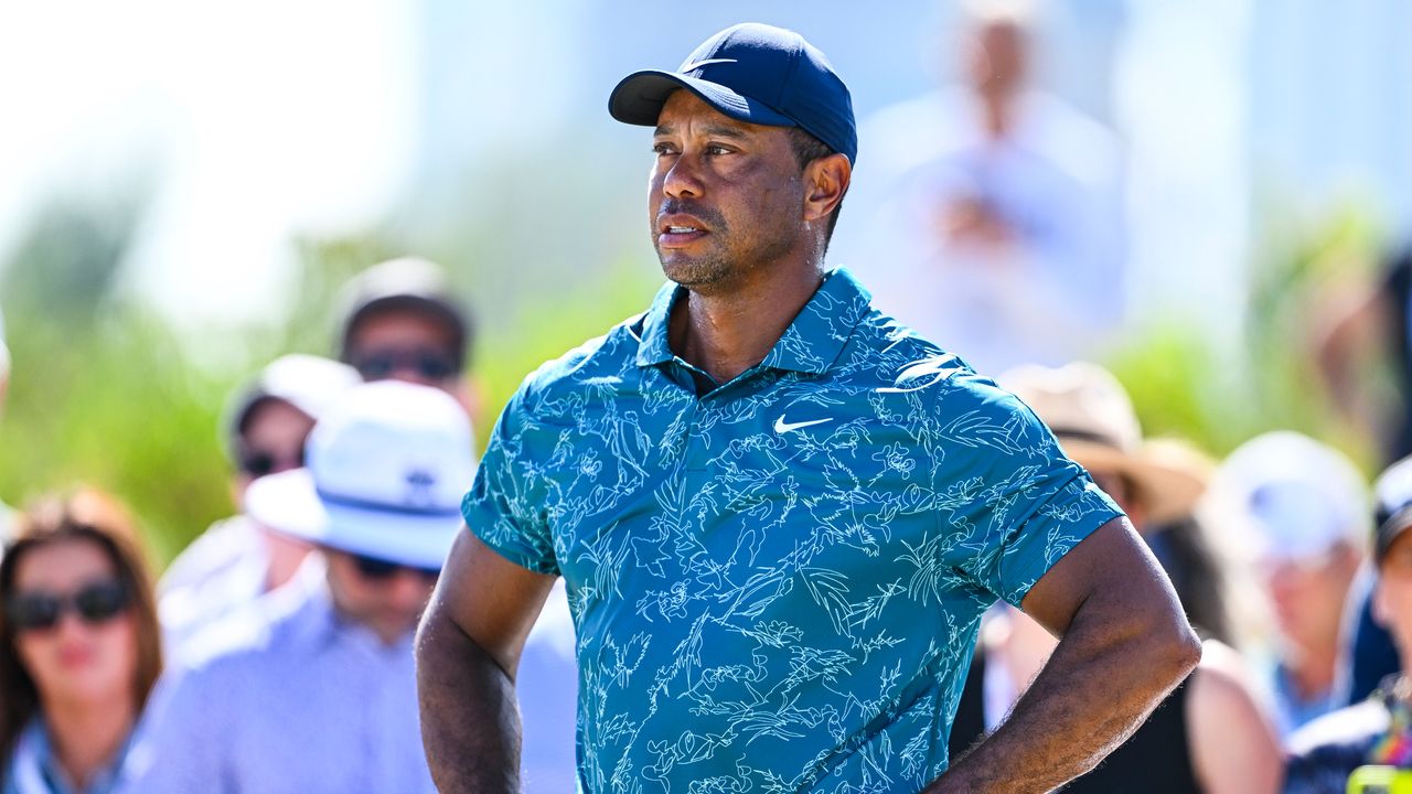 Tiger Woods with his hands on his hips during a PGA Tour round