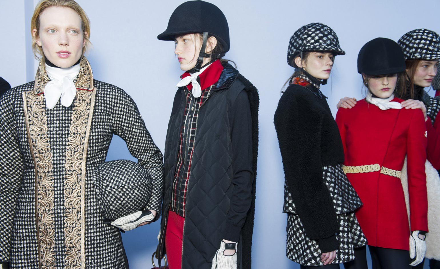 Female models backstage for Moncler Gamme Rouge A/W 2015 modelling the posh equestrian themed collection