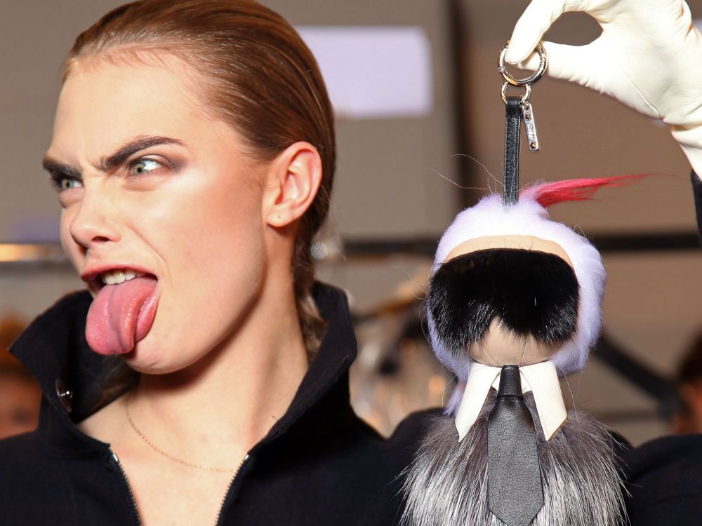 Cara Delevingne carried a Karl Lagerfeld doll in the Fendi show.