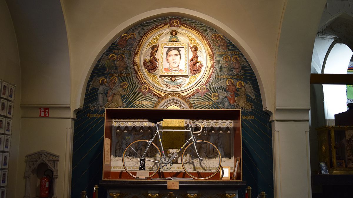 The church describe this mural of Eddy Merckx as 'Miracle Merckx'