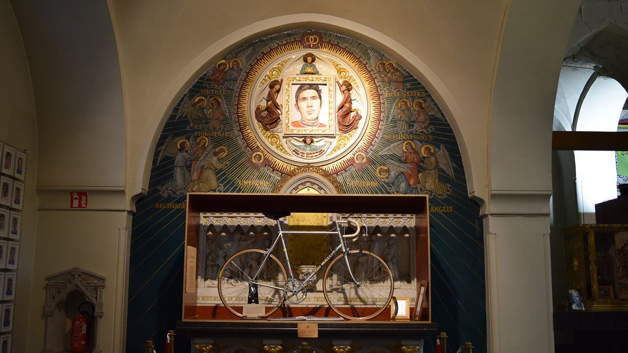 The church describe this mural of Eddy Merckx as 'Miracle Merckx'