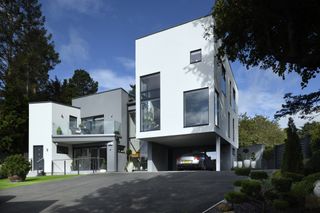 Modern timber frame home with white render