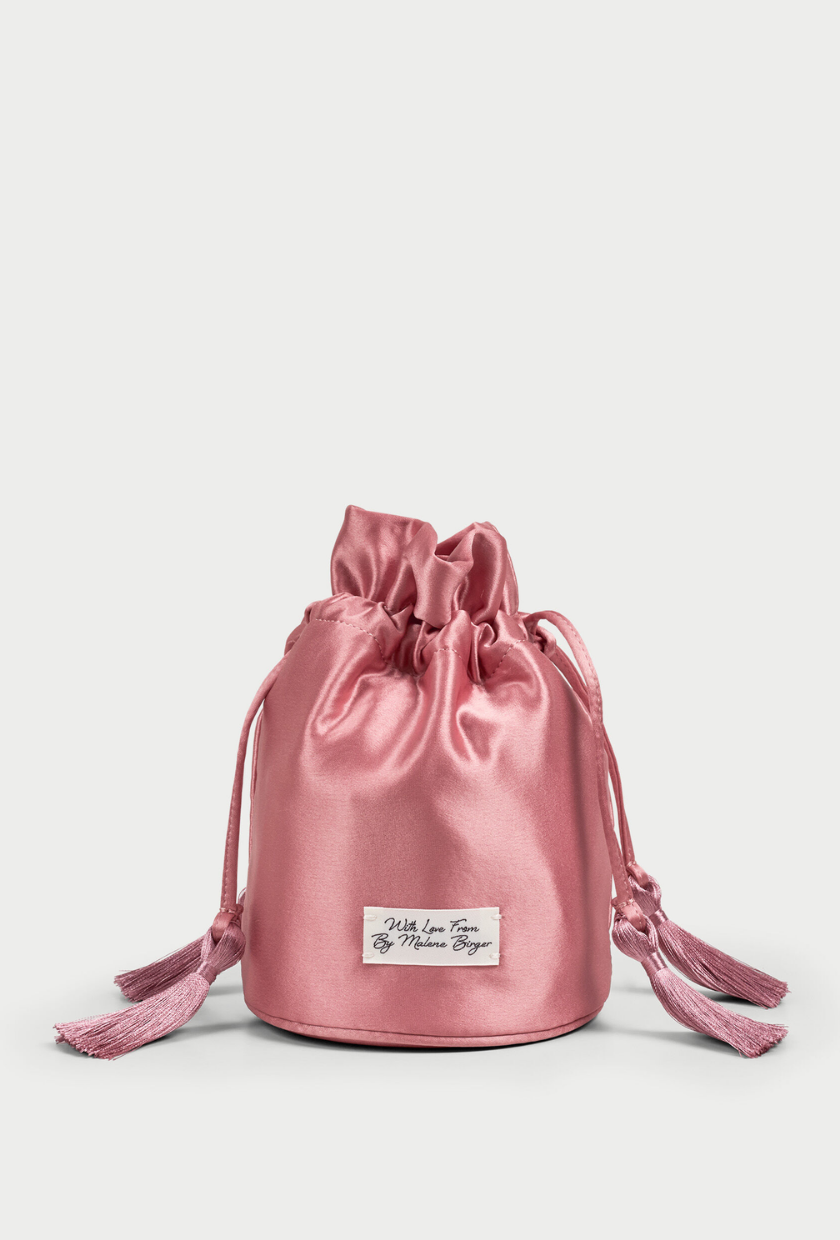 An image of a satin bag from By Malene Birger.
