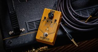 KMA Geminus Stereo True Double Tracker: the gold stompbox's fascia is dominated by one large black dial and is photographed here in close-up.