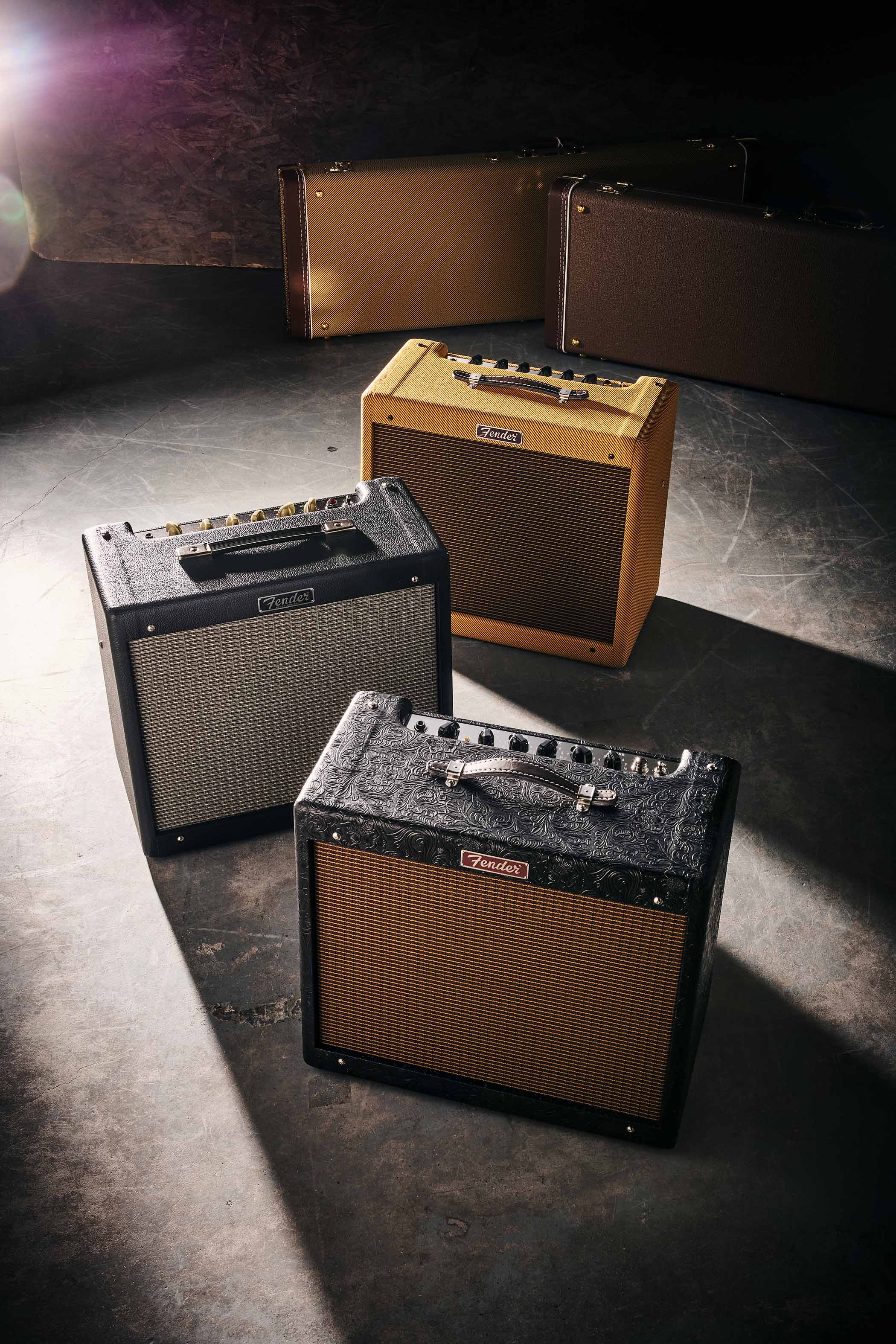 Three variants of the Fender Blues Junior, shot on an industrial floor.