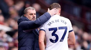 Tottenham manager Ange Postecoglou consoles Micky van de Ven after the Dutch defender is forced off against Aston Villa in March 2024. 