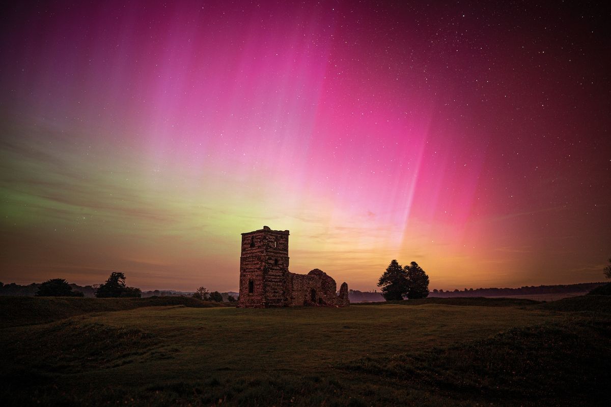 Pillars of Creation“ Captured during the G5 geomagnetic storm in May 2024, the aurora is seen above Knowlton Henge in Dorset, UK” 