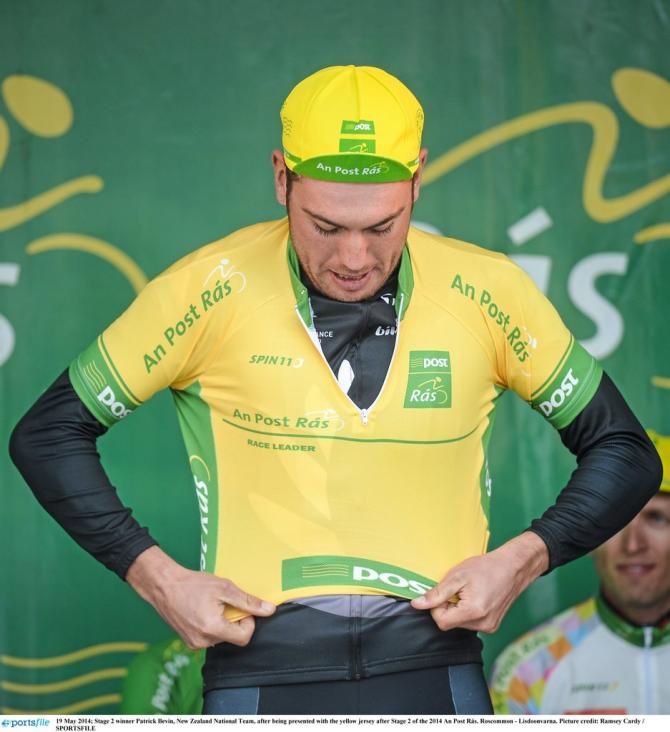 Patrick Bevin (New Zealand National Team) is presented with the yellow jersey