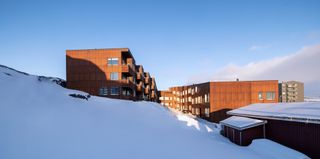 large building in greenland, showing composition of angular structures in snow