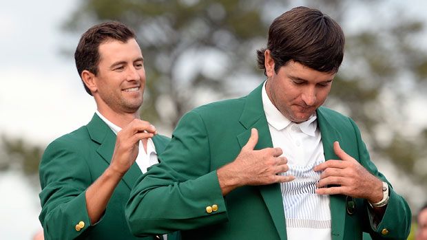 Adam Scott presents Bubba Watson with his second Green Jacket