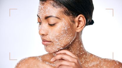 Woman with scrub all over her face, our beauty editor answers the question, how often should you exfoliate your face