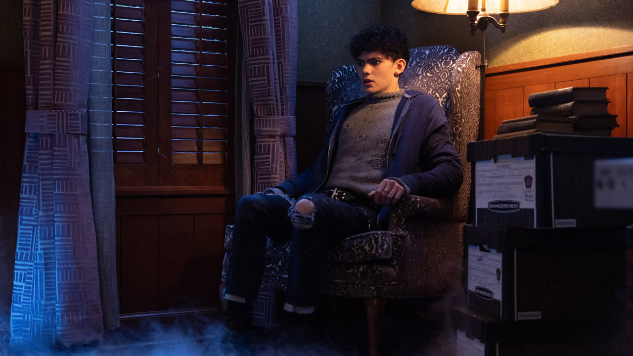 Billy/Teen looks worried as he sits in a chair in Agatha All Along