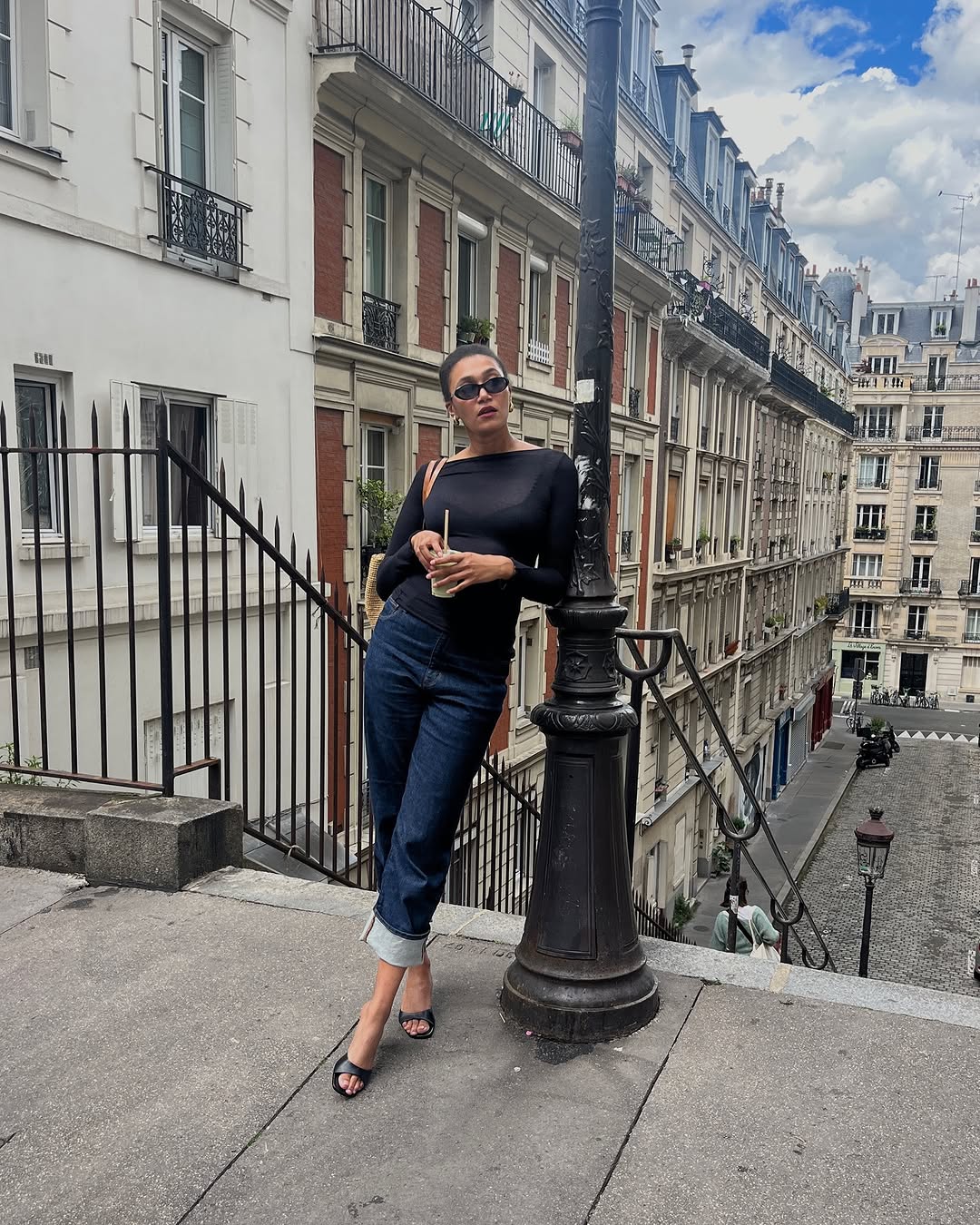 Woman wearing jeans with pointed peep-toe heels 2025.