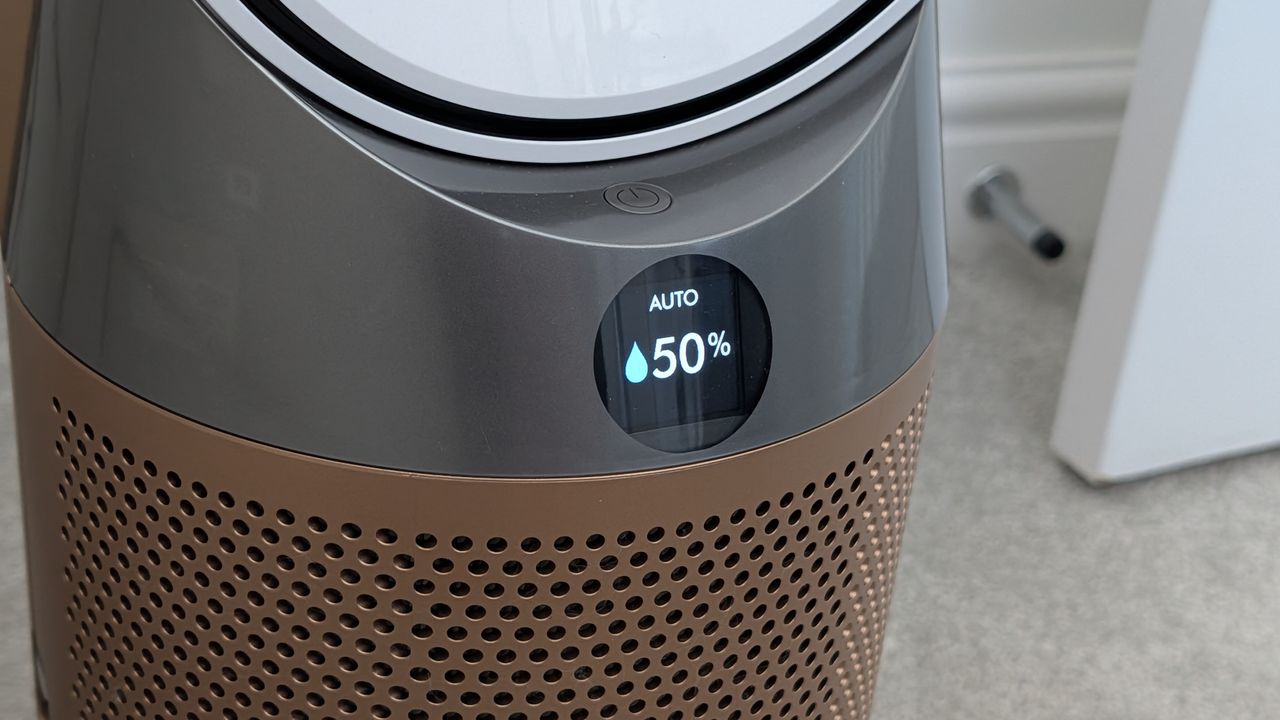 A closeup of the screen on the Dyson Find+Follow Purifier Cool showing that it's in auto mode and humidity is at 50%.