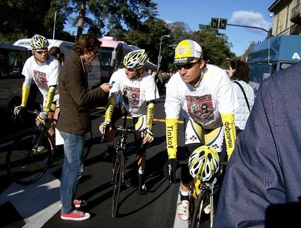Tinkoff Credit System riders are interviewed on their way to the start of the season's final ProTour race.