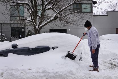 Digging a car out of the snow