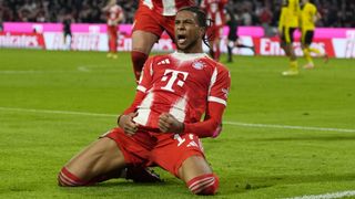 Michael Olise of Bayern Munich celebrates scoring his team's second goal during the Bundesliga match between FC Bayern M&uuml;nchen and Borussia Dortmund at Allianz Arena on October 18, 2025 in Munich, Germany. 