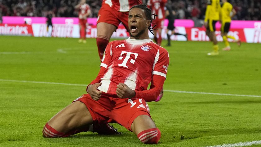 Michael Olise of Bayern Munich celebrates scoring his team's second goal during the Bundesliga match between FC Bayern M&uuml;nchen and Borussia Dortmund at Allianz Arena on October 18, 2025 in Munich, Germany. 