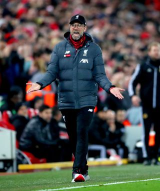Klopp gestures during the win over Wolves