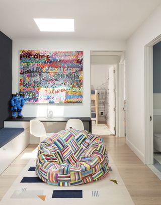 a playroom with colorful art work