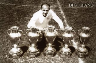 Alfredo Di Stefano poses with the five European Cups he won as a Real Madrid player between 1956 and 1960.